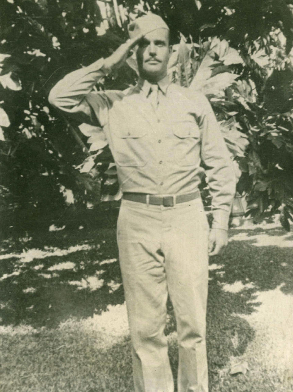 FILE - This 1942 file photo provided by Dale Ross shows his uncle, Pfc. Dale W. Ross, in Hawaii. Ross went missing in the final weeks of the World War II Battle of Guadalcanal. The U.S. Defense POW/MIA Accounting Agency has positively identified skeletal remains recovered two years ago on the Solomon Islands in the South Pacific as those of Pfc. Dale W. Ross, whose surviving family lives in Ashland, Oregon. (Courtesy of Dale Ross via AP, File)