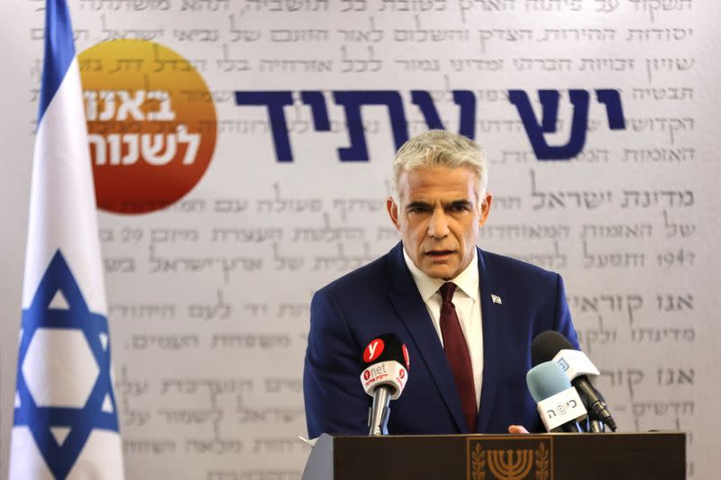 Yesh Atid party leader, Yair Lapid, speaks to the media in the Knesset, Israel's parliament, in Jerusalem