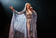 <p>Looking ethereal under the spotlight, <a href="https://people.com/tag/florence-welch/" rel="nofollow noopener" target="_blank" data-ylk="slk:Florence Welch;elm:context_link;itc:0" class="link ">Florence Welch</a> belts it out during a March 8 performance in Melbourne, Australia.</p>