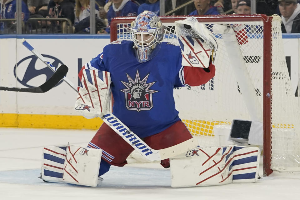 New York Rangers goaltender Igor Shesterkin (31) makes a glove save during the second period of an NHL hockey game against the Toronto Maple Leafs , Thursday, Dec. 15, 2022, at Madison Square Garden in New York. (AP Photo/Mary Altaffer)