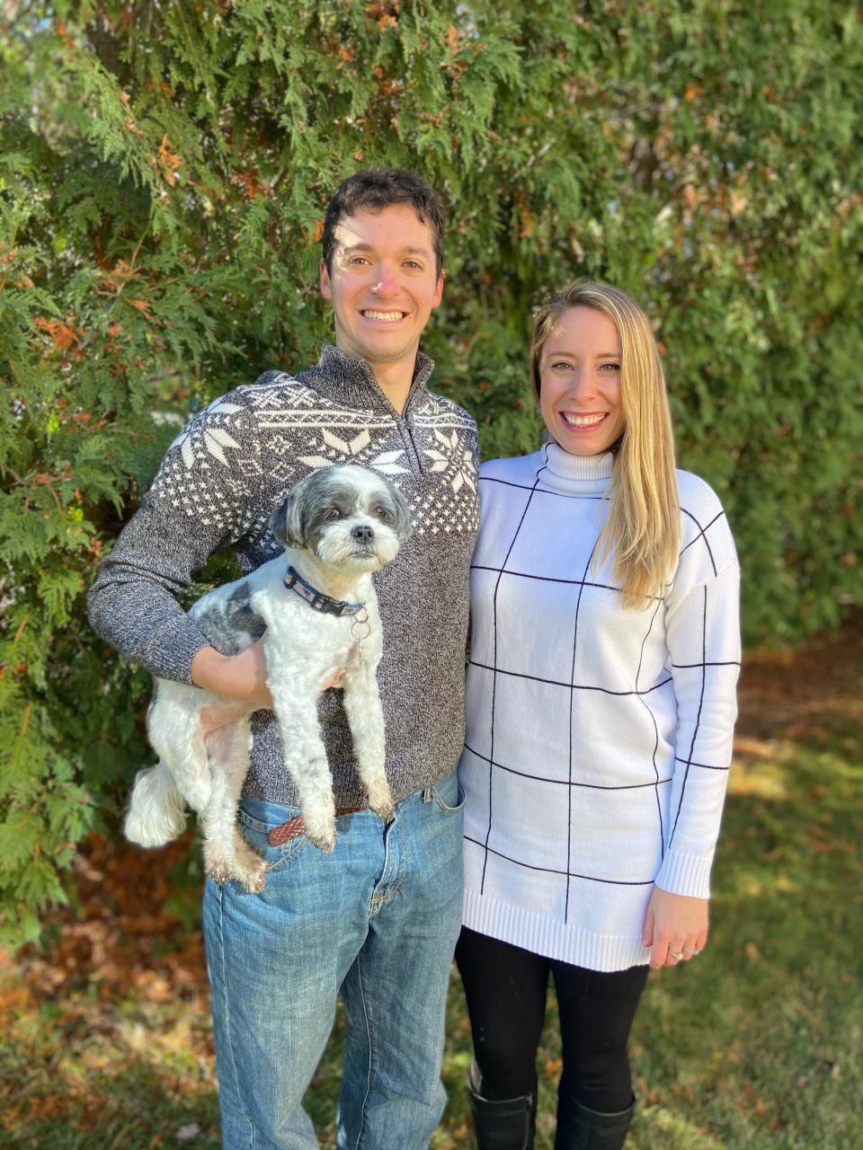 Kaitlynn, Cookie and Ian Donahue pose for a picture. The couple and their dog will be featured on a House Hunters episode on April 13, 2023.