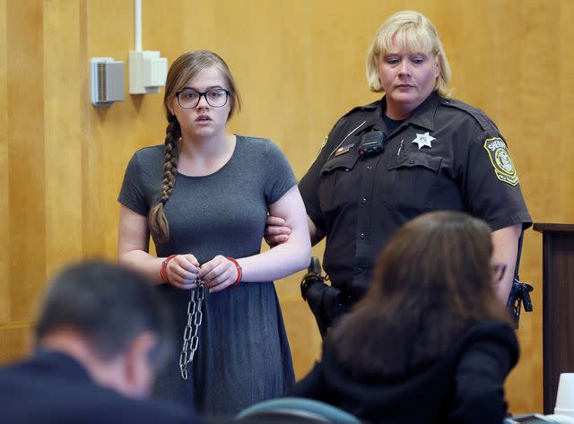 <p>Michael Sears/Milwaukee Journal-Sentinel / AP</p> Morgan Geyser is led into the courtroom at Waukesha County Court on August 19, 2016.