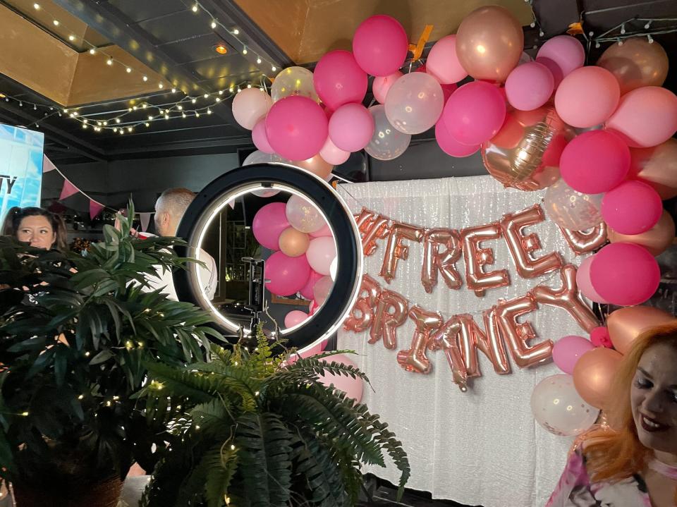 At The Naughty Pig in West Hollywood, "Free Britney" supporters staged a photo booth with pink balloons.