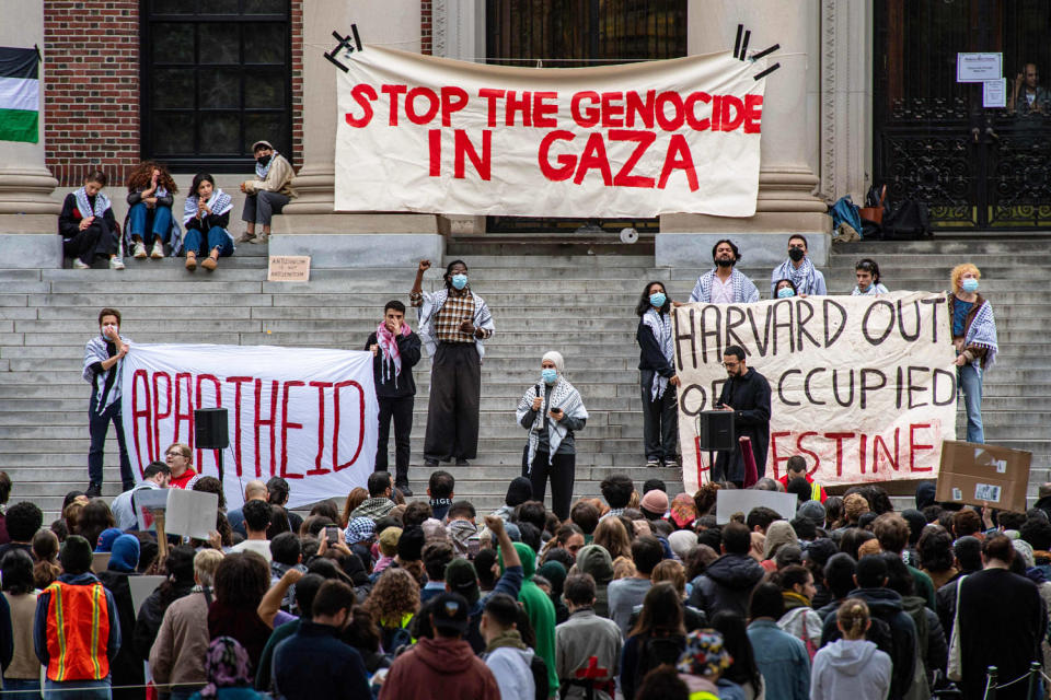 Pro-Palestine supporters speak on the steps of a Harvard University building as a crowd listens (Joseph Prezioso / AFP via Getty Images file)