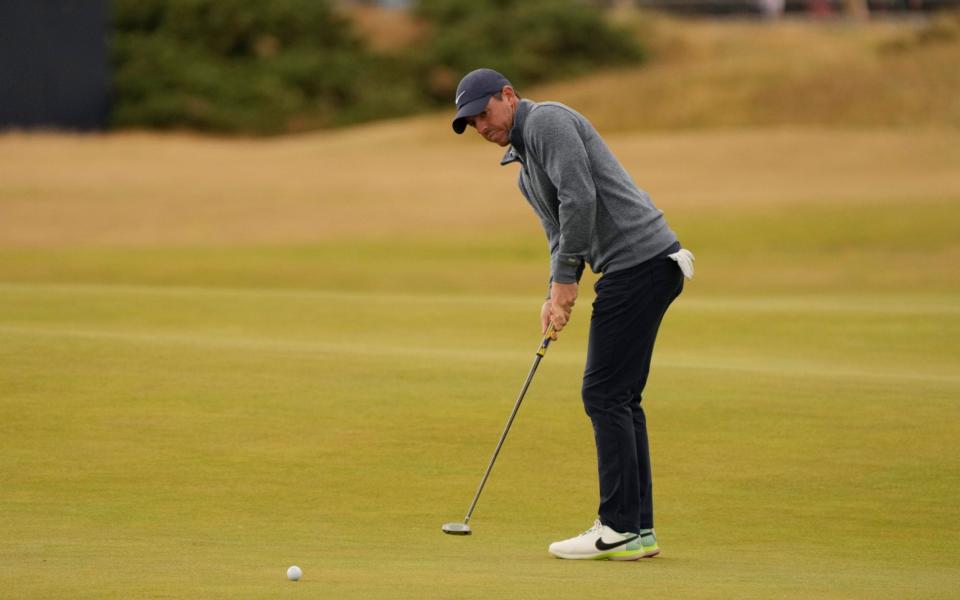 Northern Ireland's Rory McIlroy putts on the 4th green during the second round of the British Open - AP