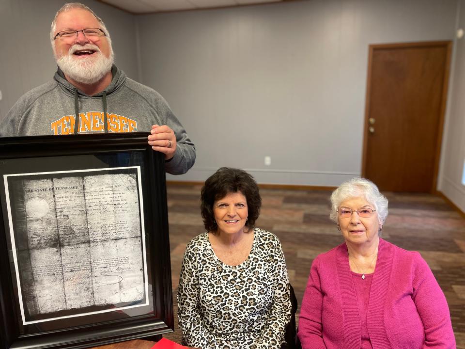 Halls Crossroads Historical Society president Carol Bayless (center) and vice president Doris Smith are with board member Chris Vandergriff in the new museum.