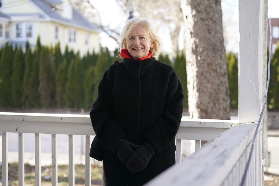 CEO of the Housing Development Fund, Joan Carty, poses for a portrait Tuesday, Dec. 29, 2020, in Stamford, Conn. With many New Yorkers moving to neighboring Connecticut during the pandemic, especially Fairfield County, it's becoming more challenging for people to find affordable homes to buy. Carty said the region's housing affordability issue is exacerbated by the influx. (AP Photo/Frank Franklin II)