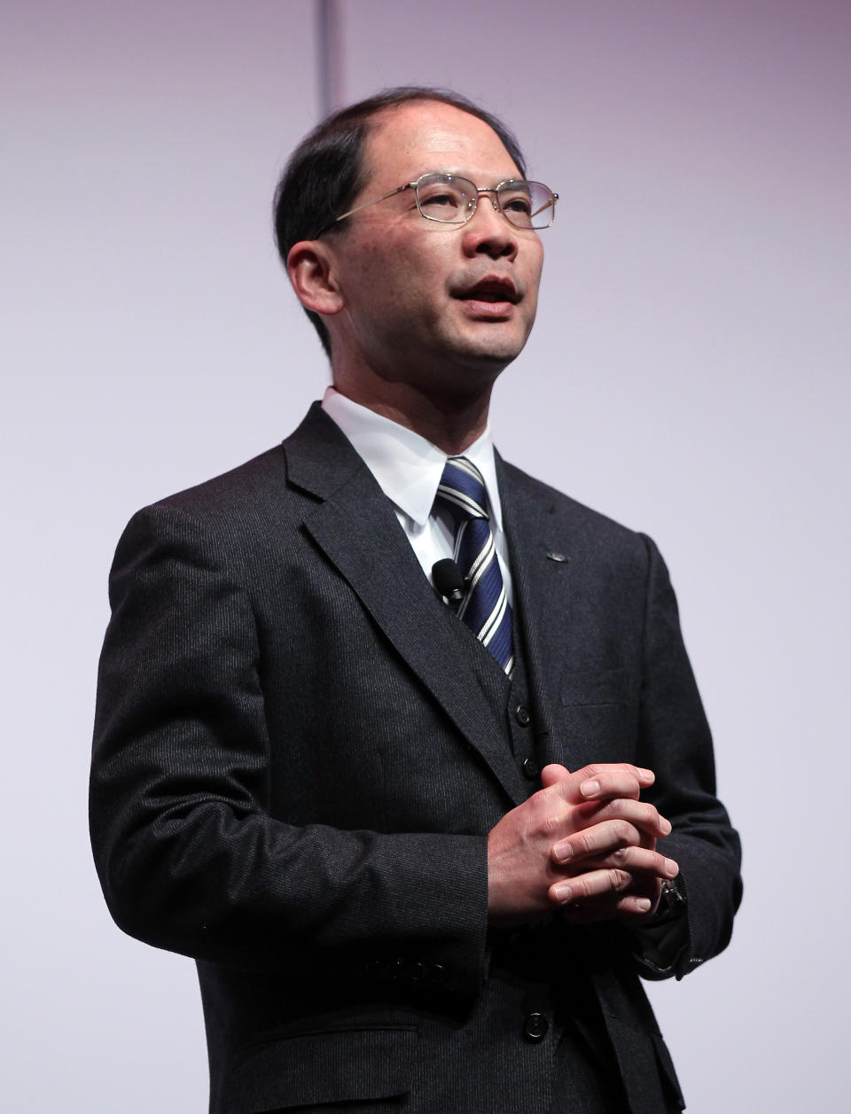 Toshi Osawa, Chairman and CEO of Sharp Electronics Corporation speaks during a news conference announcing the new lineup of Sharp televisions at the Consumer Electronics Show press day on Monday, Jan. 6, 2014, in Las Vegas. (AP Photo/Isaac Brekken)