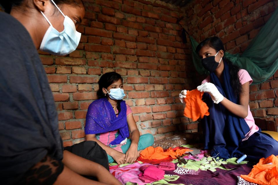 Joya Parvin, right, is a 'big sister' from Parsa district. The 18-year-old looks after 13 'little sisters' in her community: VSO/P Mathema