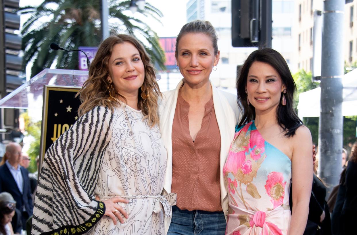 Actress Drew Barrymore (L), Cameron Diaz (C) and Lucy Liu (R) stand on the star during Liu's Walk of Fame ceremony in Hollywood on May 1, 2019. - Lucy Liu's star is the 2,662nd star on the Hollywood Walk Of Fame in the Category of Television. (Photo by VALERIE MACON / AFP)        (Photo credit should read VALERIE MACON/AFP/Getty Images)