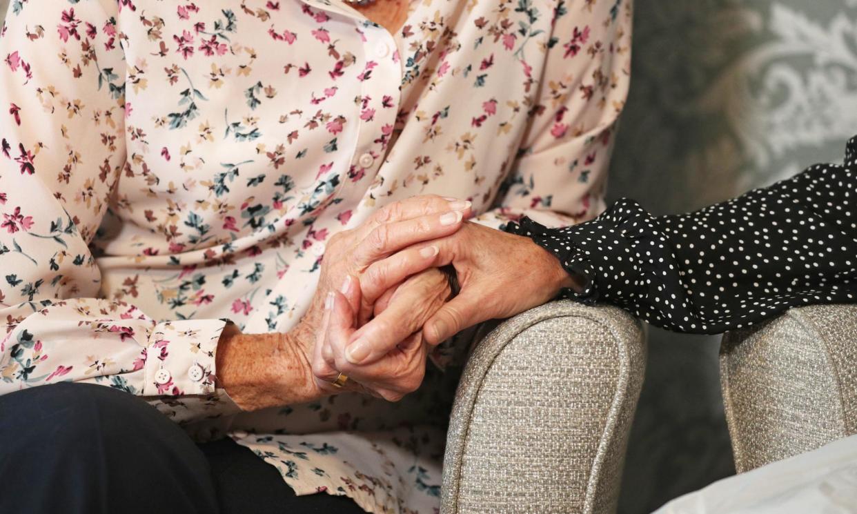 <span>There are more than 150,000 unpaid carers paying back overpayments – and in some cases being prosecuted for fraud – after falling foul of earnings rules.</span><span>Photograph: Andrew Matthews/PA</span>