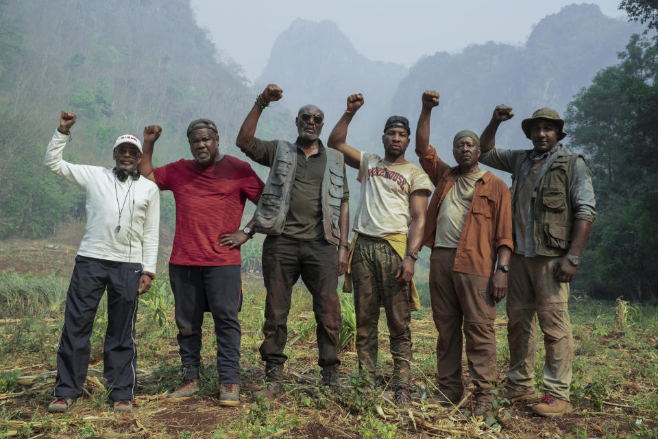 This image released by Netflix shows, from left, director Spike Lee, with cast members from his film "Da 5 Bloods," Isiah Whitlock, Jr., Delroy Lindo, Jonathan Majors, Clarke Peters and Norm Lewis. (David Lee/Netflix via AP)