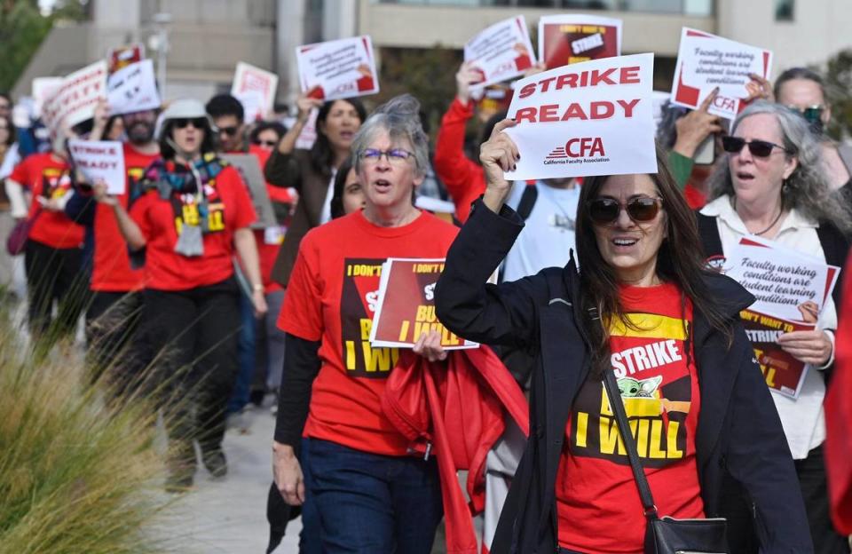 Hundreds marched through the Fresno State campus as the Fresno Chapter of the California Faculty Association held a rally calling attention and support for contract negotiations Tuesday morning, Nov. 7, 2023 in Fresno.