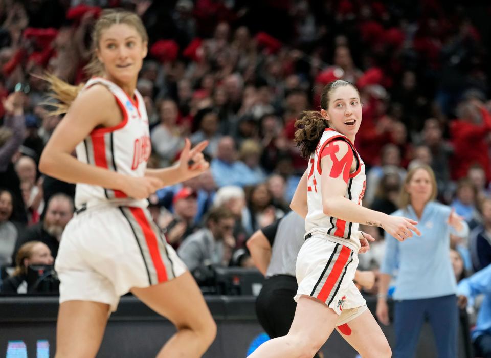 Mar 20, 2023; Columbus, OH, USA; Ohio State Buckeyes guard Taylor Mikesell (24) smiles after making a shot against North Carolina Tar Heels during the fourth quarter of the NCAA second round game at Value City Arena. 