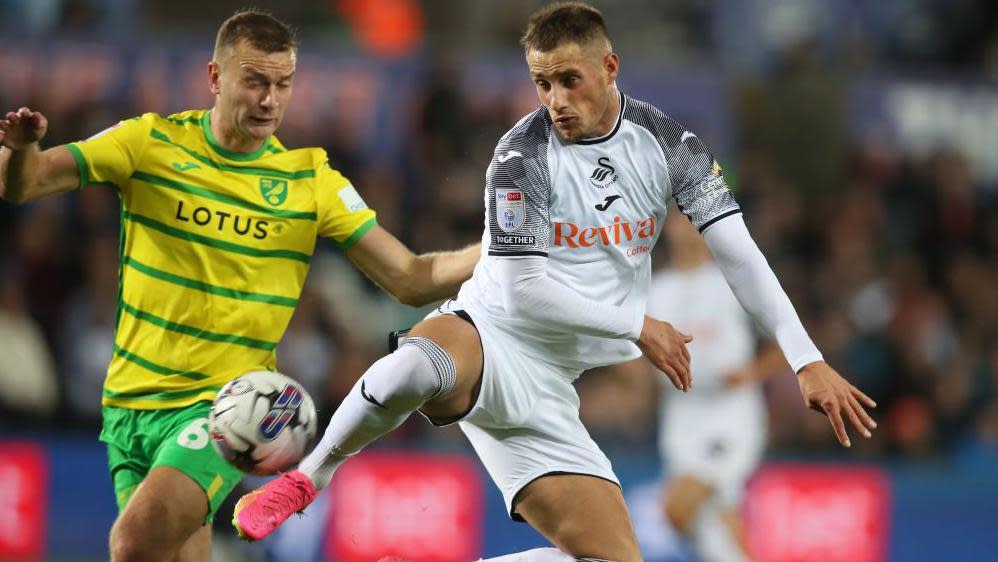 Jerry Yates and Ben Gibson during Swansea's home game against Norwich earlier this season