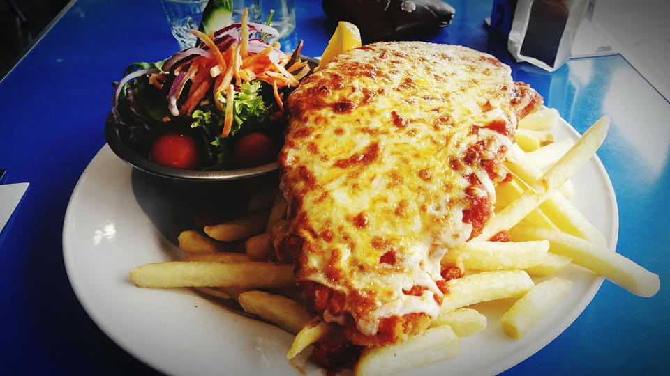 A chicken parmigiana is pictured.