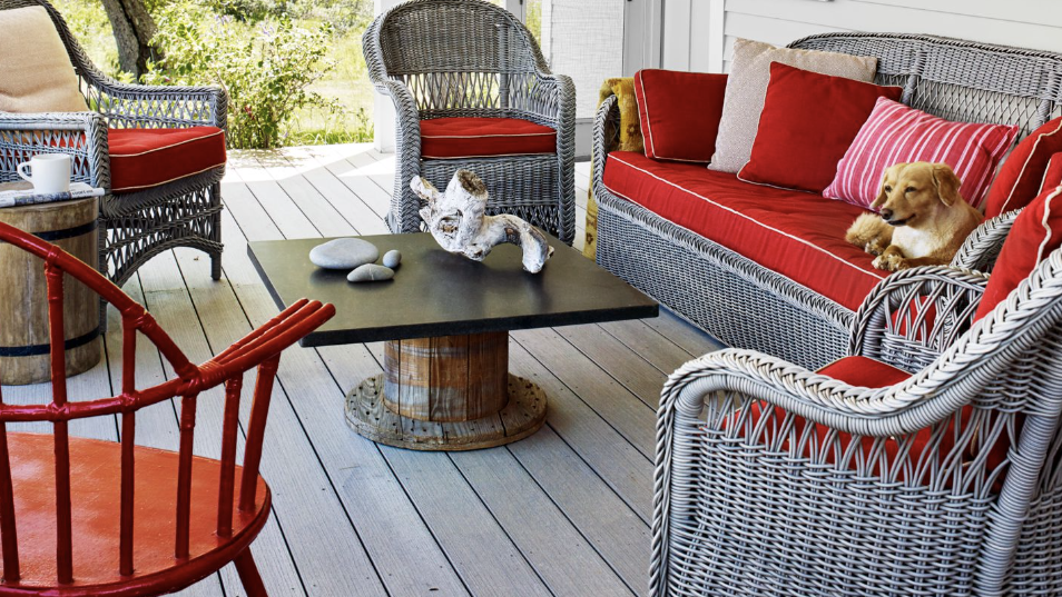 red cushions and gray furniture on a porch