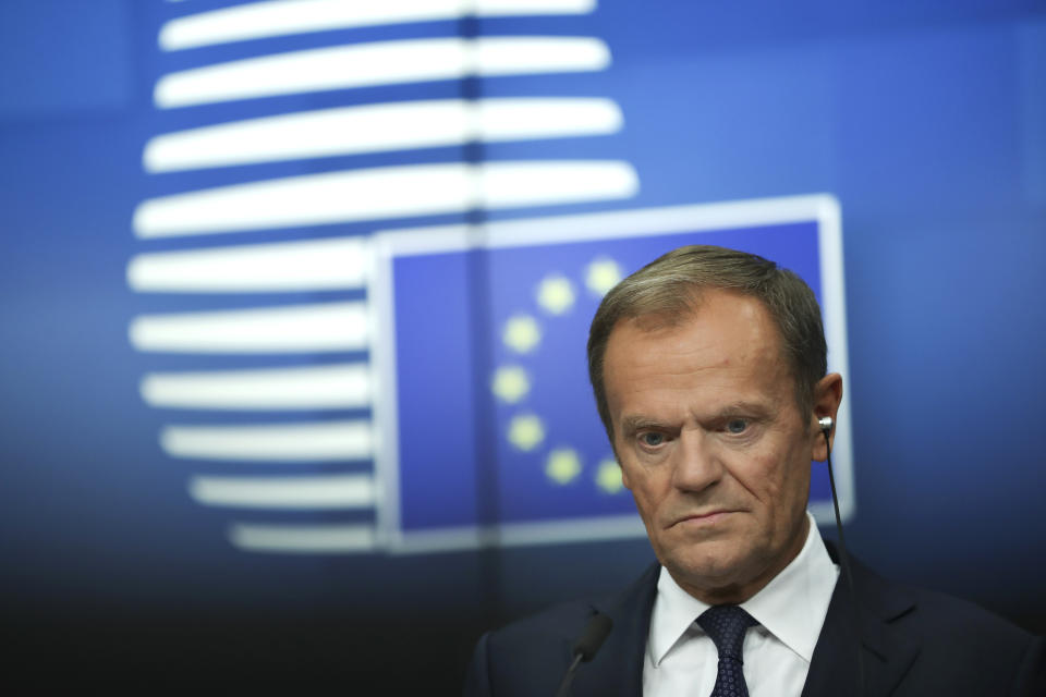 European Council President Donald Tusk listens to questions during a media conference at the conclusion of an EU summit in Brussels, Friday, March 22, 2019. European Union leaders gathered again Friday after deciding that the political crisis in Britain over Brexit poses too great a threat and that action is needed to protect the smooth running of the world's biggest trading bloc. (AP Photo/Francisco Seco)