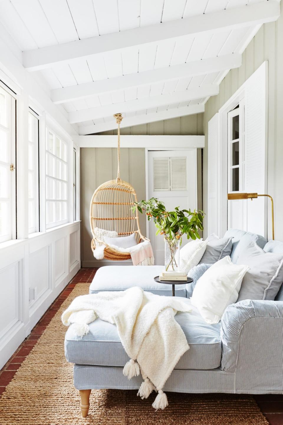 sunroom with a porch swing