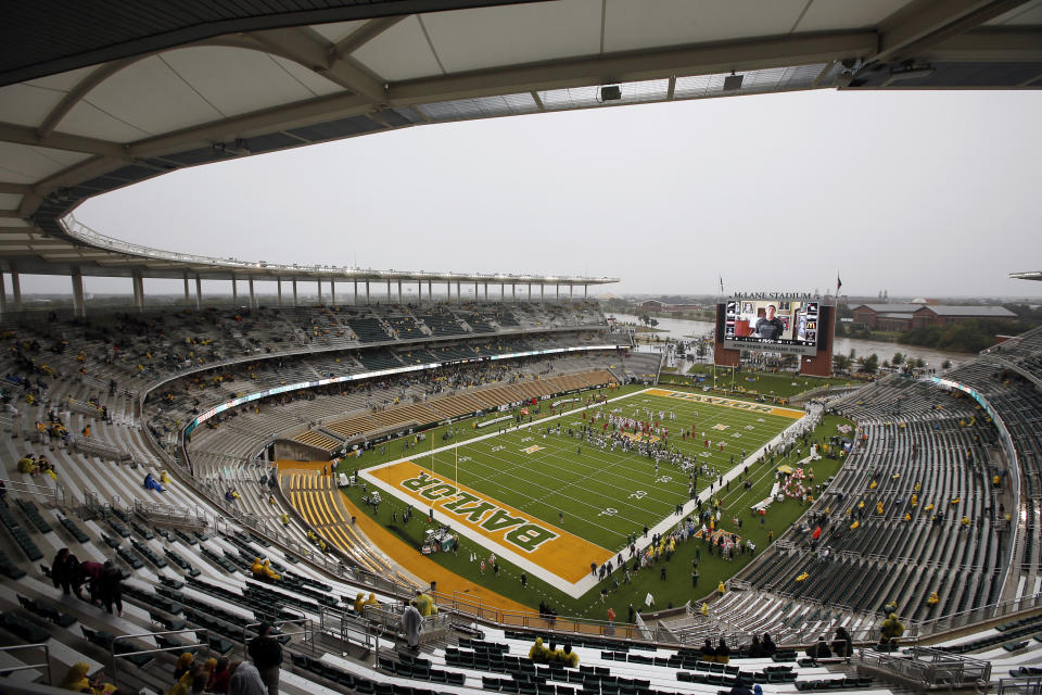 FILE - In this Oct. 24, 2015, file photo, a nearly empty McLane Stadium is seen minutes before kickoff between Iowa State and Baylor in an NCAA college football game, in Waco, Texas. Baylor University will look to rebuild its reputation and perhaps its football program after an outside review found administrators mishandled allegations of sexual assault and the team operated under the perception it was above the rules. (AP Photo/Tony Gutierrez, File)