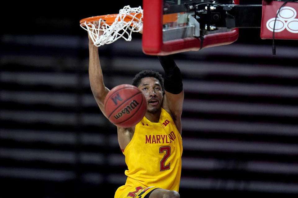 Maryland guard Aaron Wiggins dunks on Michigan State during the second half of an NCAA college basketball game, Sunday, Feb. 28, 2021, in College Park, Md. Maryland won 73-55. (AP Photo/Julio Cortez)
