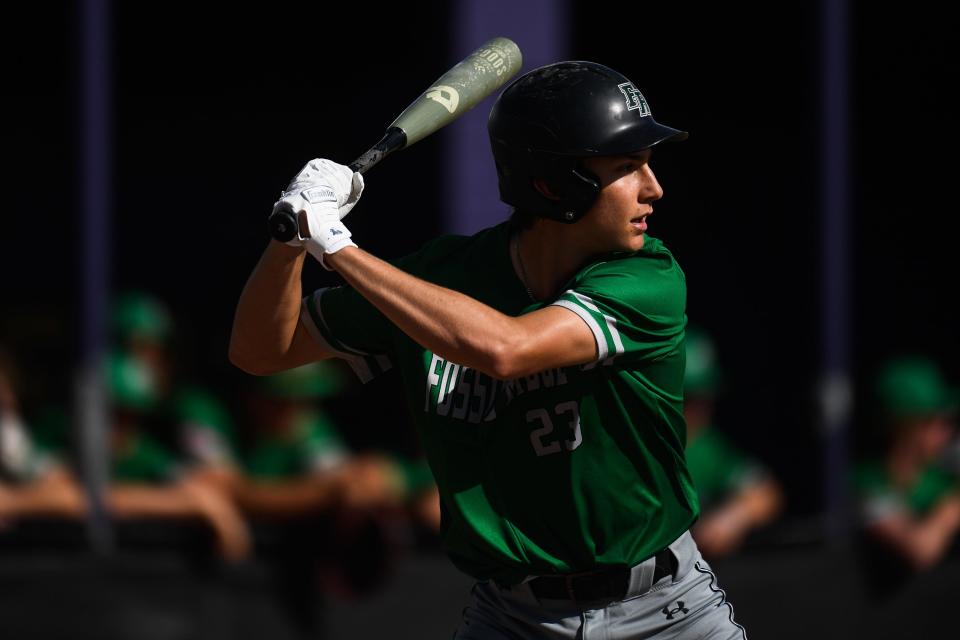Fossil Ridge's Jensen Planansky (23) eyes an incoming pitch during a high school baseball game against Fort Collins at Fort Collins High School on Tuesday, April 18, 2023, in Fort Collins, Colo.