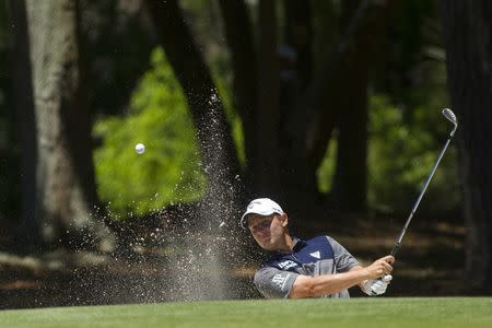 Apr 21, 2019; Hilton Head, SC, USA; Emiliano Grillo hits from the bunker on the green of the first hole during the final round of the RBC Heritage golf tournament at Harbour Town Golf Links. Mandatory Credit: Joshua S. Kelly-USA TODAY Sports