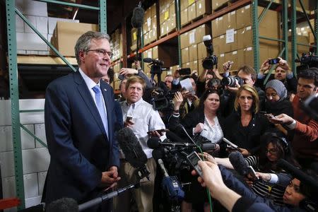 Former Florida Governor Jeb Bush speaks to the media after visiting Integra Biosciences during a campaign stop in Hudson, New Hampshire March 13, 2015. REUTERS/Shannon Stapleton