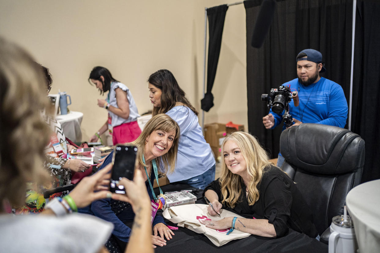 Colleen Hoover with a fan at Book Bonanza  on June 23, 2023 in Grapevine, TX.  (Nitashia Johnson for TODAY)