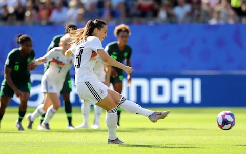 Sara Daebritz of Germany scores a penalty for her team's second goal. - Credit: Getty Images