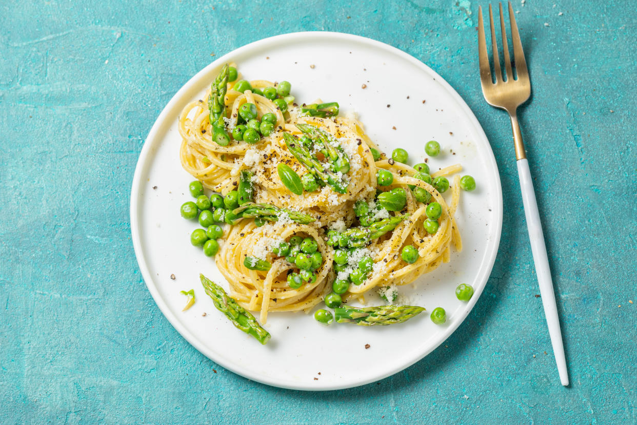 eat what you want tiktok pasta on a white plate with a blue background