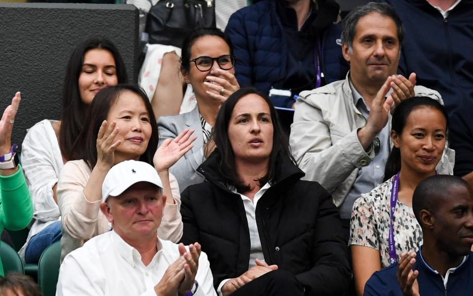 The parents of Emma - Renee (middle left) and Ian (top right) at Wimbledon - ANDY HOOPER