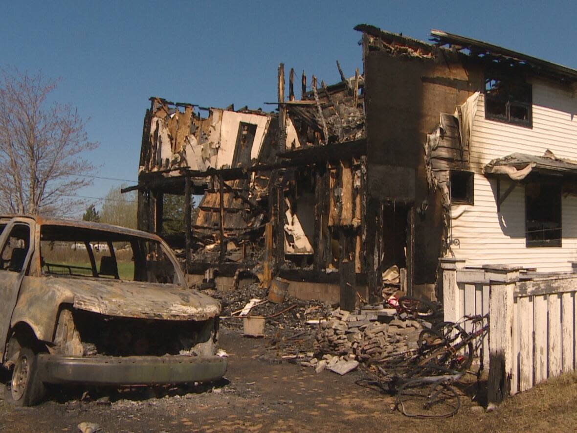 This is what's left of the house in Saint-Leolin where the foreign workers at a Grande-Anse fish plant were staying. (Radio-Canada - image credit)