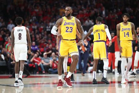 Oct 18, 2018; Portland, OR, USA; Los Angeles Lakers forward LeBron James (23) reacts after dunking against the Portland Trail Blazers in the first half at Moda Center. Mandatory Credit: Jaime Valdez-USA TODAY Sports