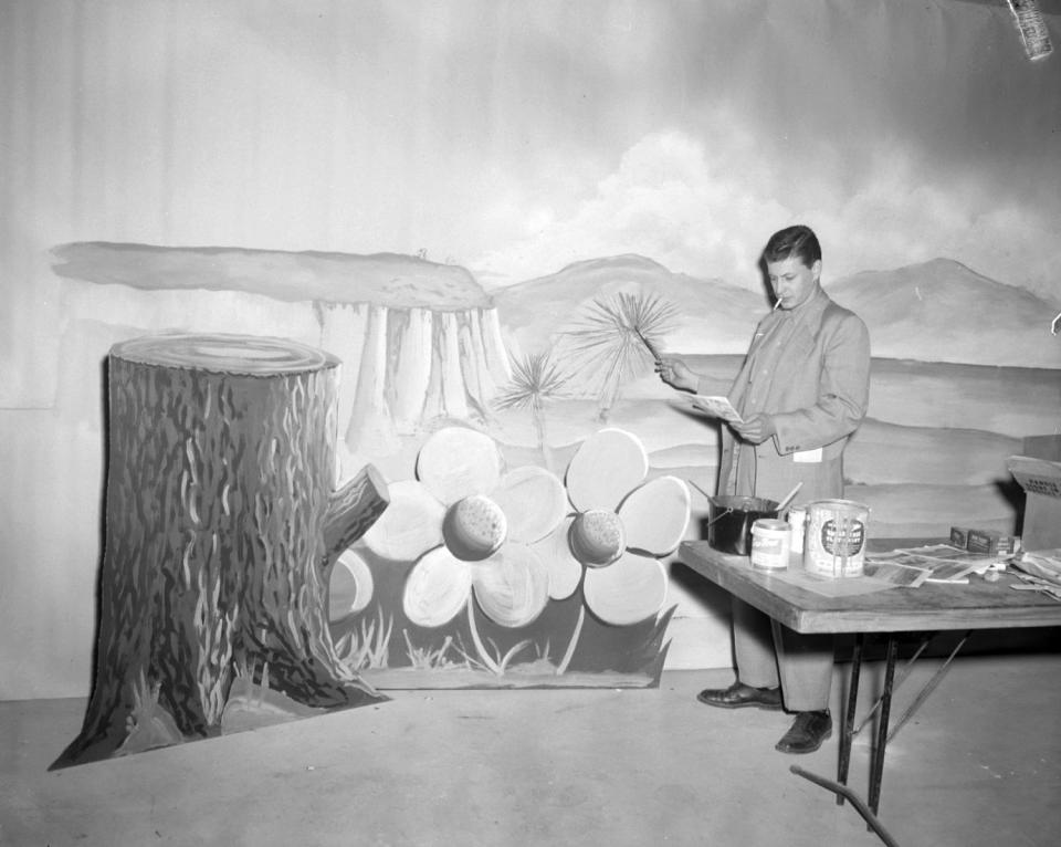 Dec. 14, 1952: Scenery, backdrops, and paintings will play a large role in the production of television programs in El Paso for local viewers. Jim Tumey is the head of the Arts Department at KROD-TV under an expansion program that has brought some 20 top television experts into El Paso to join the staff of the local station. Tumey and his staff will produce everything from small signs to canvas backdrops that will cover the side of a building.