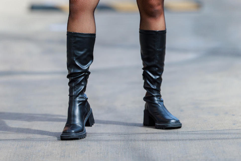 A closer look at Tinashe’s tall black leather boots. - Credit: MEGA