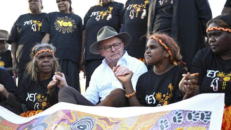 The Indigenous women presented him with his copy of the Uluru Voice from the Heart statement. Picture: NCA NewsWire / Martin Ollman