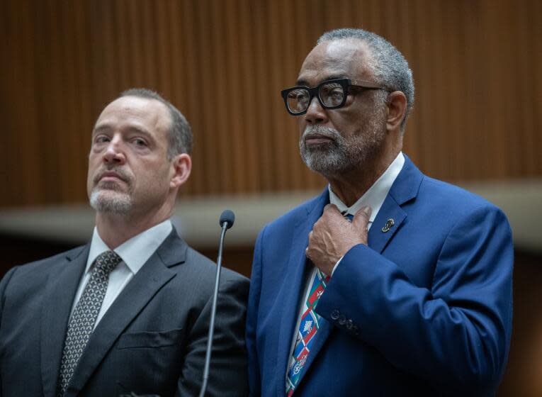LOS ANGELES, CA - JULY 13: Los Angeles City Councilmember Curren Price, right, and his attorney David Willingham appear in court on Thursday, July 13, 2023. His arraignment was continued to August. Price is charged with embezzlement of government funds, perjury and conflict of interest. (Myung J. Chun / Los Angeles Times)