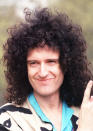 <p>The Queen guitarist will go down in history as the man with the biggest mop of curls of all time. [Photo: PA] </p>