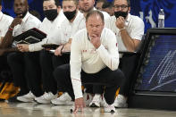 Wisconsin head coach Greg Gard watches action in the first half during an NCAA college basketball game against St. Mary's at the Maui Invitational in Las Vegas, Wednesday, Nov. 24, 2021. (AP Photo/Rick Scuteri)