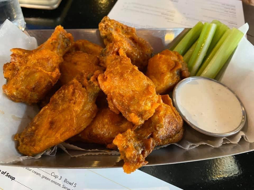 Taps on Main offers Buffalo wings served with scratch-made bleu cheese sauce.