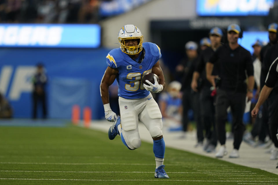 Los Angeles Chargers running back Austin Ekeler runs on his way to scoring a touchdown during the first half of an NFL football game against the Chicago Bears, Sunday, Oct. 29, 2023, in Inglewood, Calif. (AP Photo/Ryan Sun)