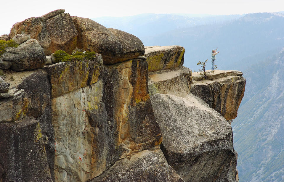 Awestruck hiker at Taft Point Overlook, Yosemite National Park. Source: Getty Images, File