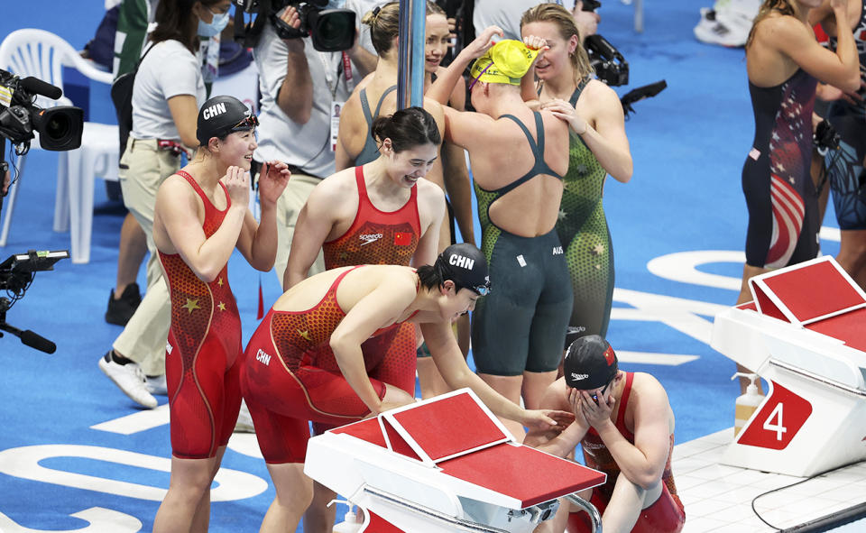 The Australian team, pictured here after China claimed gold in the 4x200m relay at the Tokyo Olympics.
