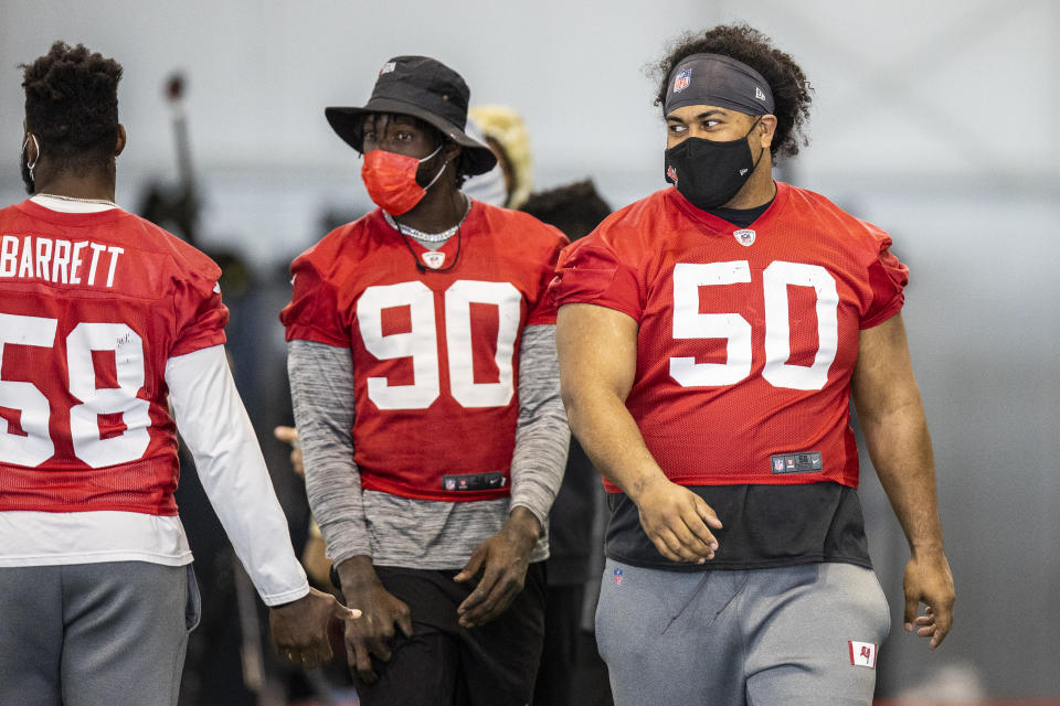 Tampa Bay Buccaneers defensive tackle Vita Vea walks between drills during NFL football practice, Tuesday, Feb. 2, 2021 in Tampa, Fla. The Buccaneers will face the Kansas City Chiefs in Super Bowl 55. (Tori Richman/Tampa Bay Buccaneers via AP)