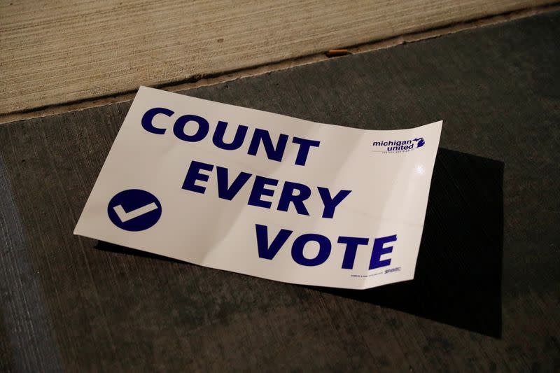 A "Count Every Vote" sign is seen on the ground as votes continue to be counted at the TCF Center the day after the 2020 U.S. presidential election, in Detroit, Michigan