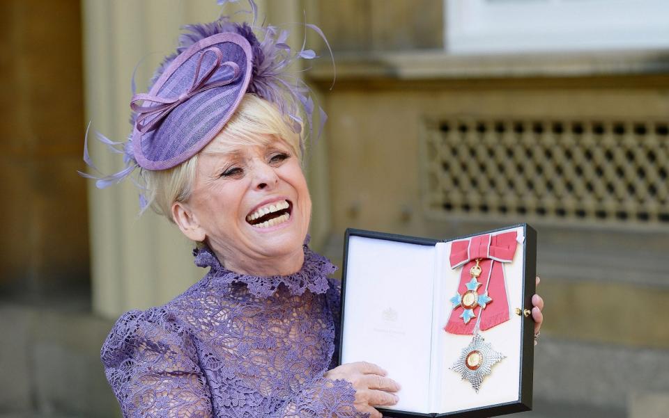 Barbara Windsor after she was made Dame Commander of the British Empire in 2016 - John Stillwell