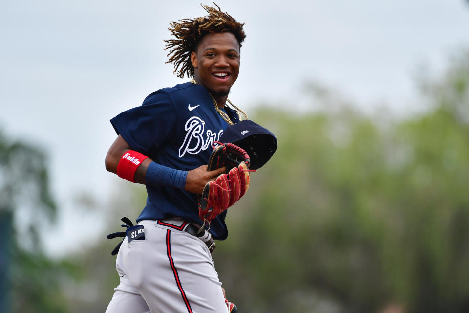 SARASOTA, FLORIDA - FEBRUARY 26: Ronald Acuna Jr. #13 of the Atlanta Braves runs to the outfield during the middle of the third inning of a spring training baseball game against the Baltimore Orioles at Ed Smith Stadium on February 26, 2020 in Sarasota, Florida. (Photo by Julio Aguilar/Getty Images)