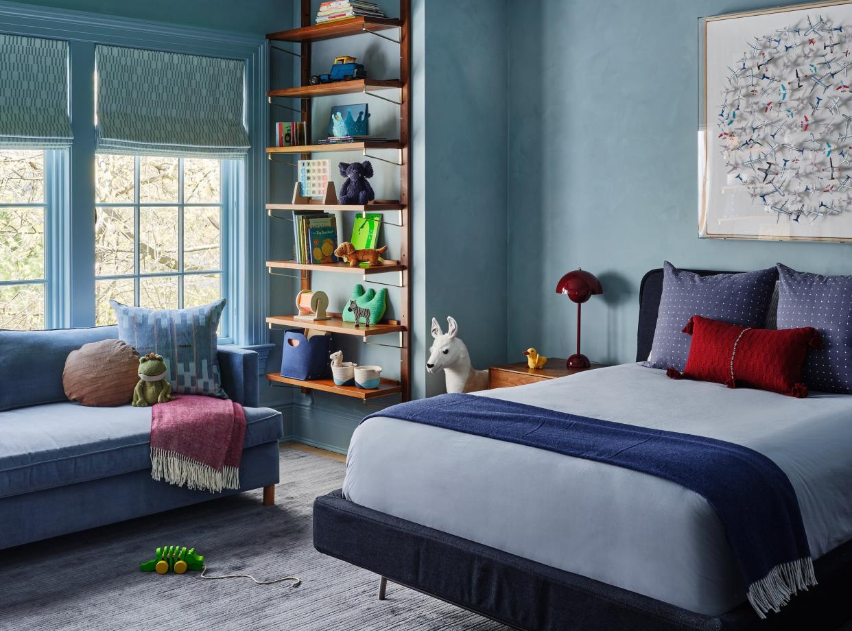  A child's blue bedroom. 