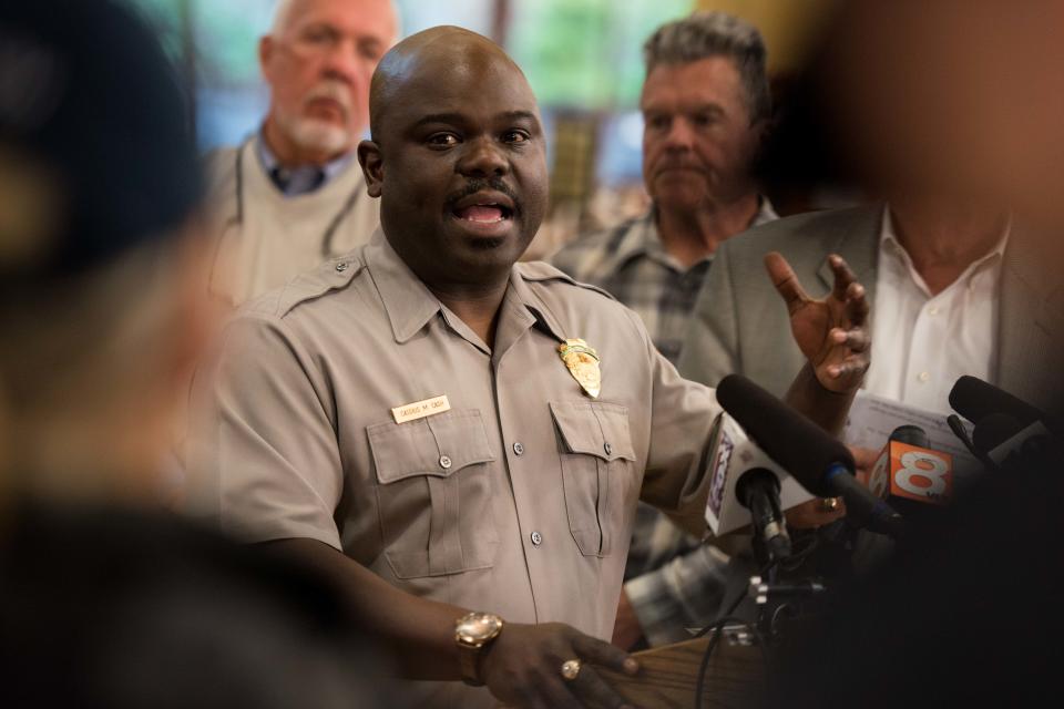 Cassius Cash, superintendent of the Great Smoky Mountains National Park, speaks during a press conference in Gatlinburg, Tenn., Wednesday, Nov. 30, 2016.
